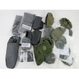 A quantity of British Military SA80 sight covers, some as new in packaging, assorted. Twenty items.