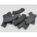 A quantity AK 7.62 magazines. Ten items.