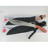 Two 'as new' machetes by Kukri Machete, in protective cases in original packaging.