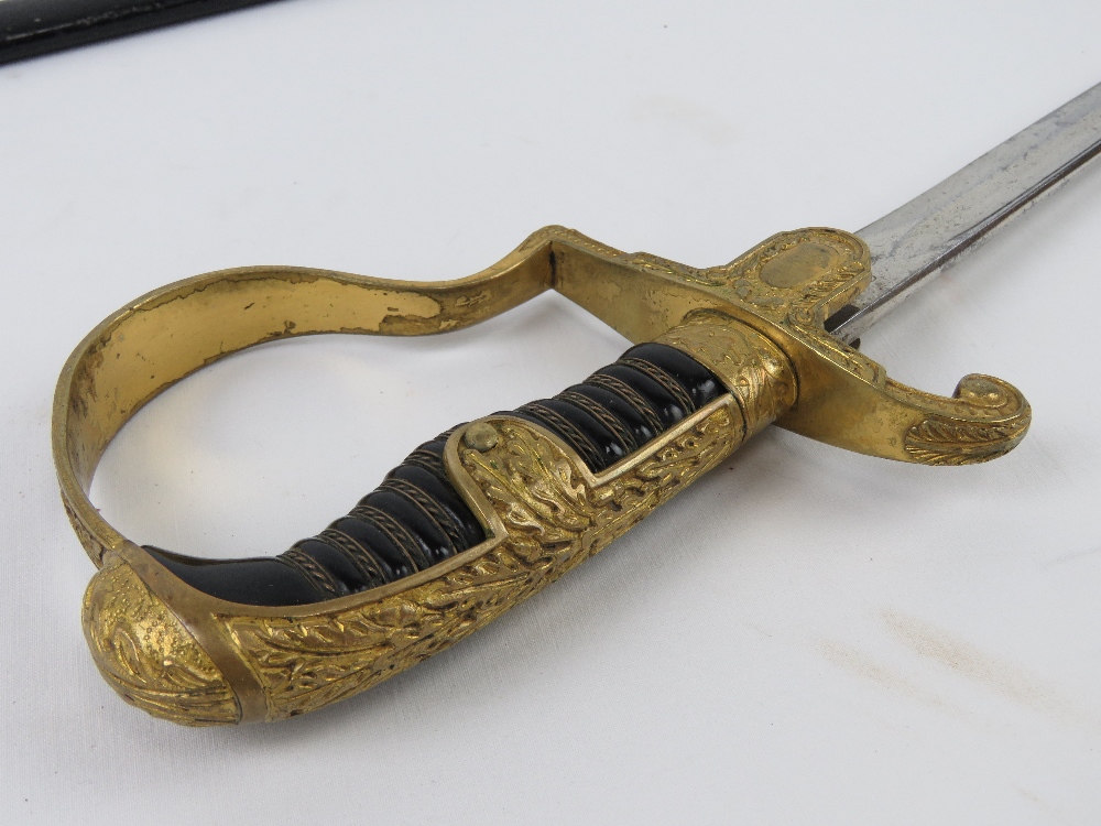 A WWII German Officer's sword with scabbard, bearing makers mark on the blade for Eikhorn Solingen, - Image 3 of 6