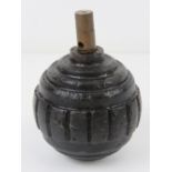 An inert WWI German Kugel grenade with fuse.