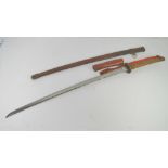 A WWII Japanese NCO's sword having wrapped shagreen handle with outer leather covering.