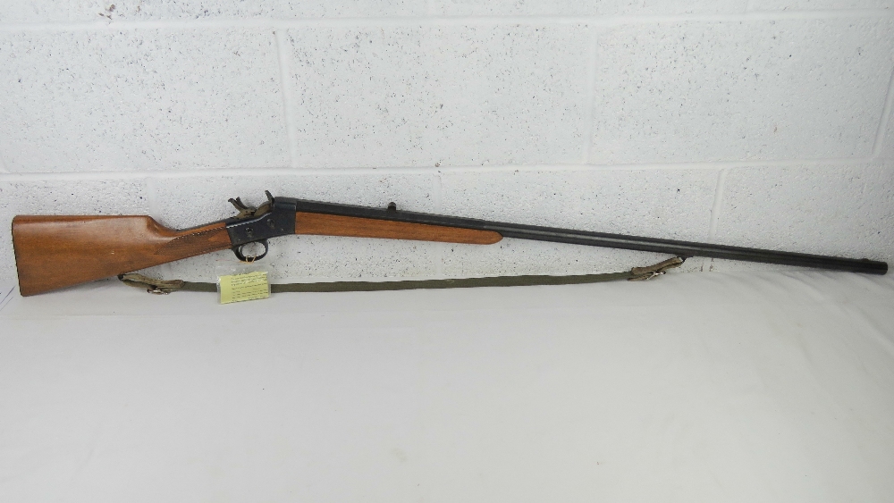 A deactivated Norwegian Kongsberg Rolling Block 12 gauge shotgun with canvass sling,