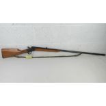 A deactivated Norwegian Kongsberg Rolling Block 12 gauge shotgun with canvass sling,