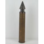 An inert WWII Russian T34 76MM shell, dated 1944. Standing 54cm high.