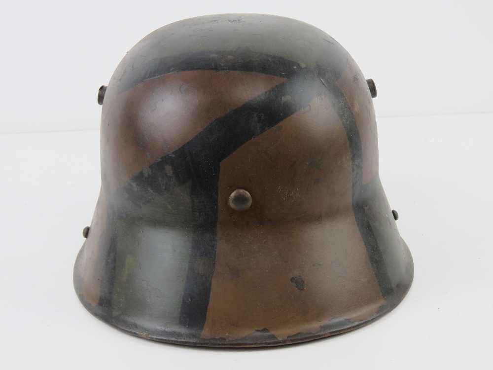 A reproduction WWI German M16 helmet with liner having camo paint. - Image 3 of 4