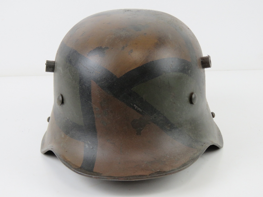A reproduction WWI German M16 helmet with liner having camo paint. - Image 2 of 4