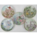 A set of four Villeroy & Bosch flower fairy plates based on the drawings of Cicely Mary Barker.