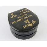 A leather shirt stud box 'A stud in the box is worth two under the bed'',