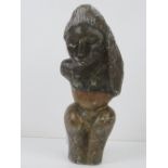 A soapstone fertility figurine standing 28cm high, a/f.