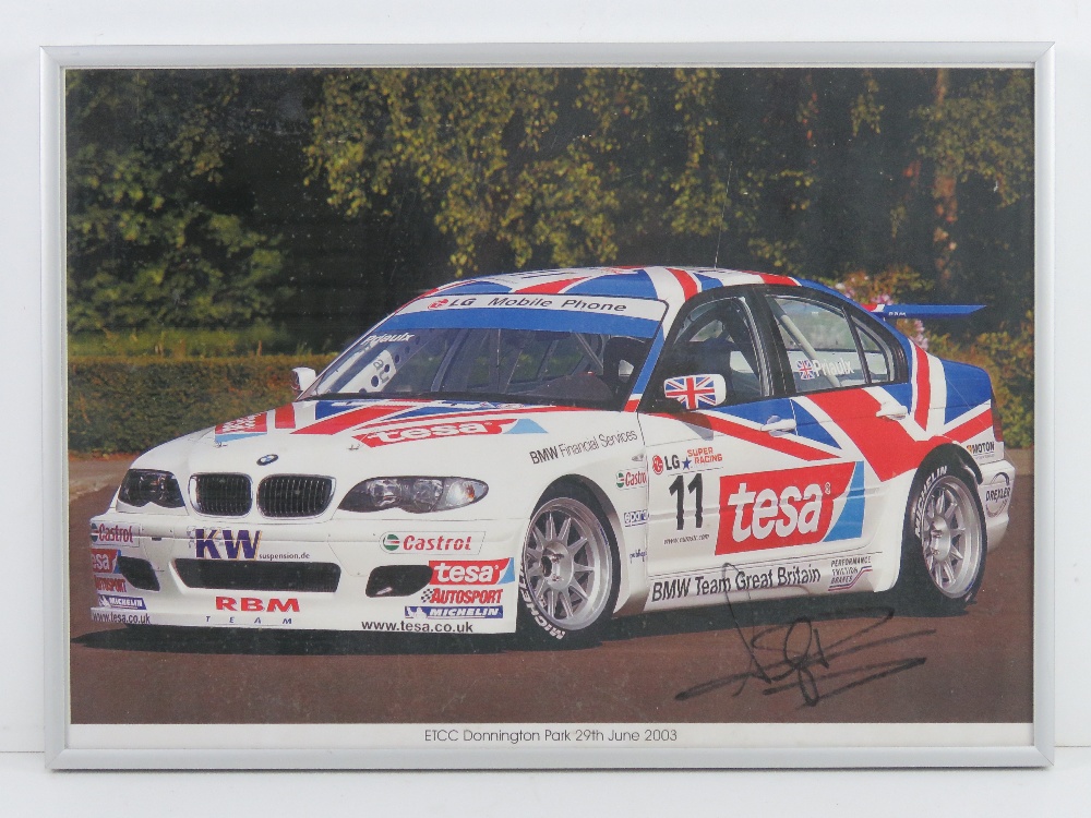 A framed photographic print from the ETCC Donington Park Race Meeting 29th June 2003 signed by Andy