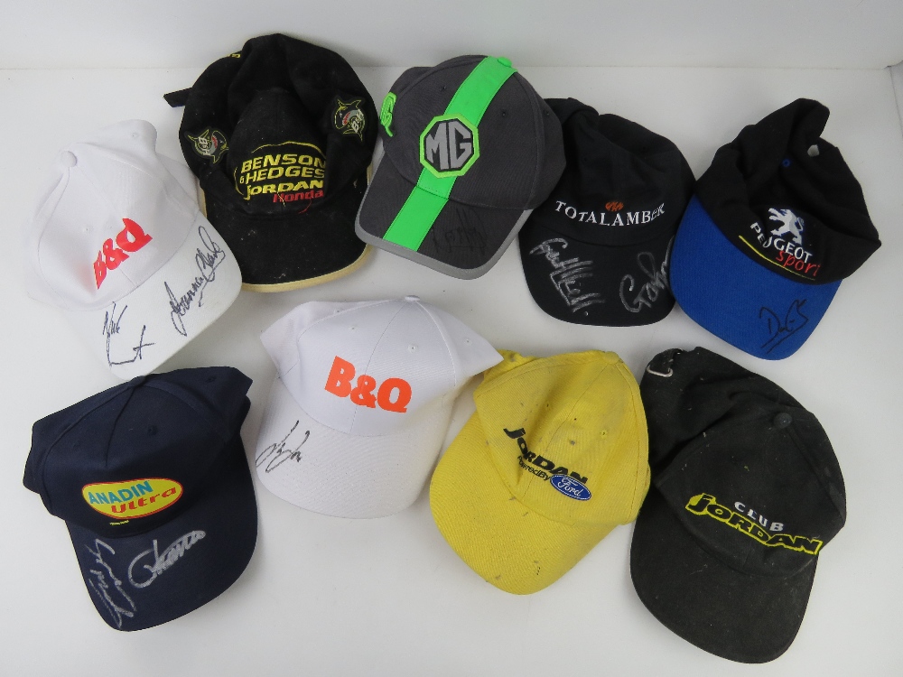 A quantity of nine assorted baseball caps inc motoring themed, of which six are hand signed.