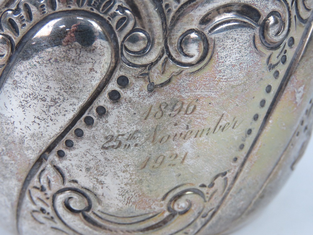 A HM silver repoussé planter having floral design, hallmarked London (date indistinct), 12cm dia, 4. - Image 2 of 3