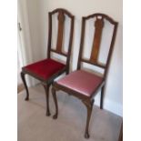 A pair of high back Edwardian vertical splat chairs, each with drop in seat and Queen Anne legs.