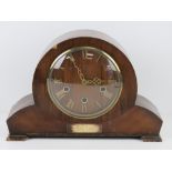 A three train striking over mantle clock, c1950s mahogany case, allied Arabic numerals,