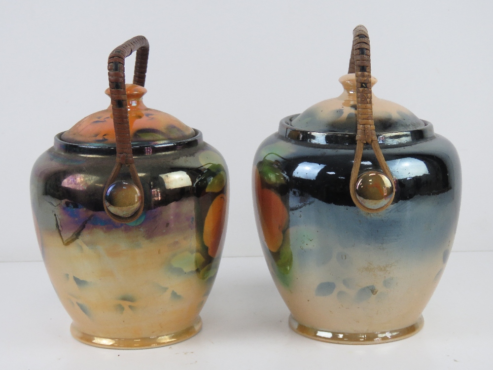 Two ceramic pearlescent wafer / biscuit barrels each with wicker handle and fruit design upon. - Image 6 of 6