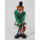 A Murano-style art glass clown figurine standing 26cm high.