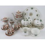Two part tea services, one by Royal Stafford comprising cake plate, milk jug, sugar bowl and trios,