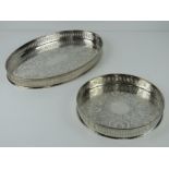 A large oval silver plated tray, 38cm wide, with matching smaller circular silver plated tray, 24.