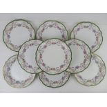 A quantity of L Bernardaud Limoge plates made for Waring & Gillow Oxford Street, London,