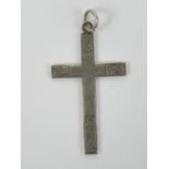 A silver crucifix pendant having scrolling engraving to front, stamped sterling, 3.