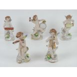 A set of five ceramic angelic musicians, Continental, each approx 12cm high,