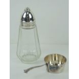 A Christofle silver plated sugar sifter, together with an individual silver plated 'saucepan'.