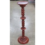 A torchere or planter stand having barley twist column, standing 97cm high.