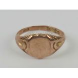 A 9ct rose gold gentleman's signet ring, hallmarked 375, unengraved, size T, 4.