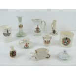 Nine items of assorted Crested ware.