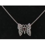 A delightful silver and marcasite butterfly pendant on rope twist chain, pendant 2.