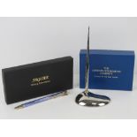 A London Goldsmiths Company silver plated desktop pen and stand.