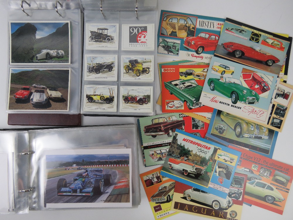 Three albums containing a large quantity of motoring and car themed photo cards, photos,