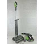 G-Tech; a wireless freestanding vacuum together with a hand held cleaner. Two items, with charger.
