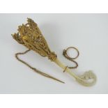A Victorian Tussie Mussie (Tussy Mussy) posy holder having carved mother of pearl handle and a gilt
