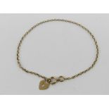 A 9ct gold chain bracelet with heart padlock charm upon, hallmarked 375, 19cm in length, 1.3g.