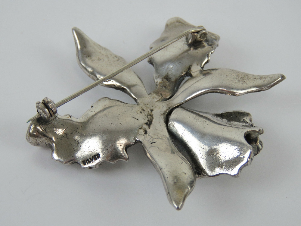 A vintage silver and marcasite brooch in the form of an orchid, 5cm wide, 26.6g. - Image 2 of 2