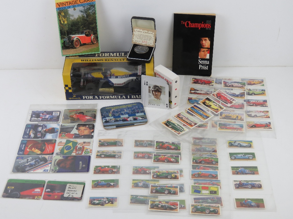 A quantity of Formula One and motoring memorabilia inc Williams Renault FW14 model car,