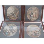 A set of twelve months of the year re-struck oval mounted prints in wooden frames,
