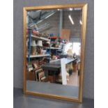 A contemporary rectangle bevel edged mirror in gilt frame 68 x 98.