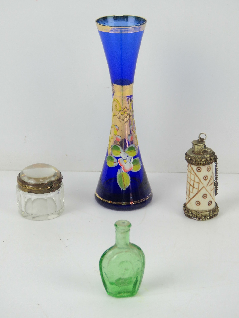 A Venetian hand painted glass bud vase, 15cm high, together with a carved bone scent bottle,