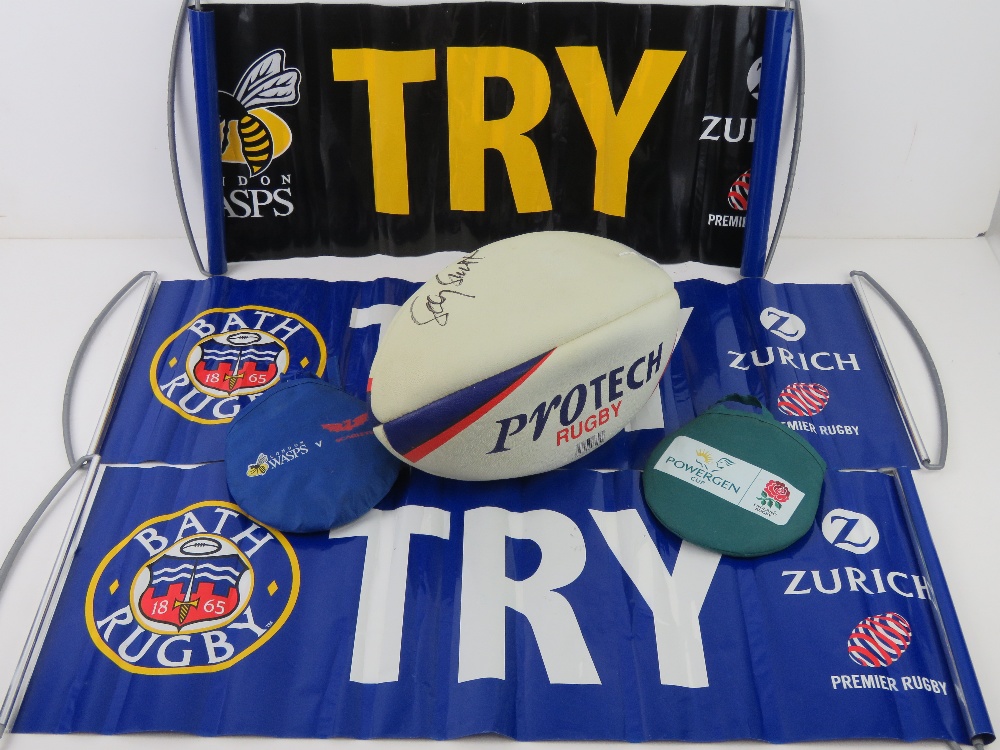 A quantity of Rugby memorabilia inc a signed Rugby ball.