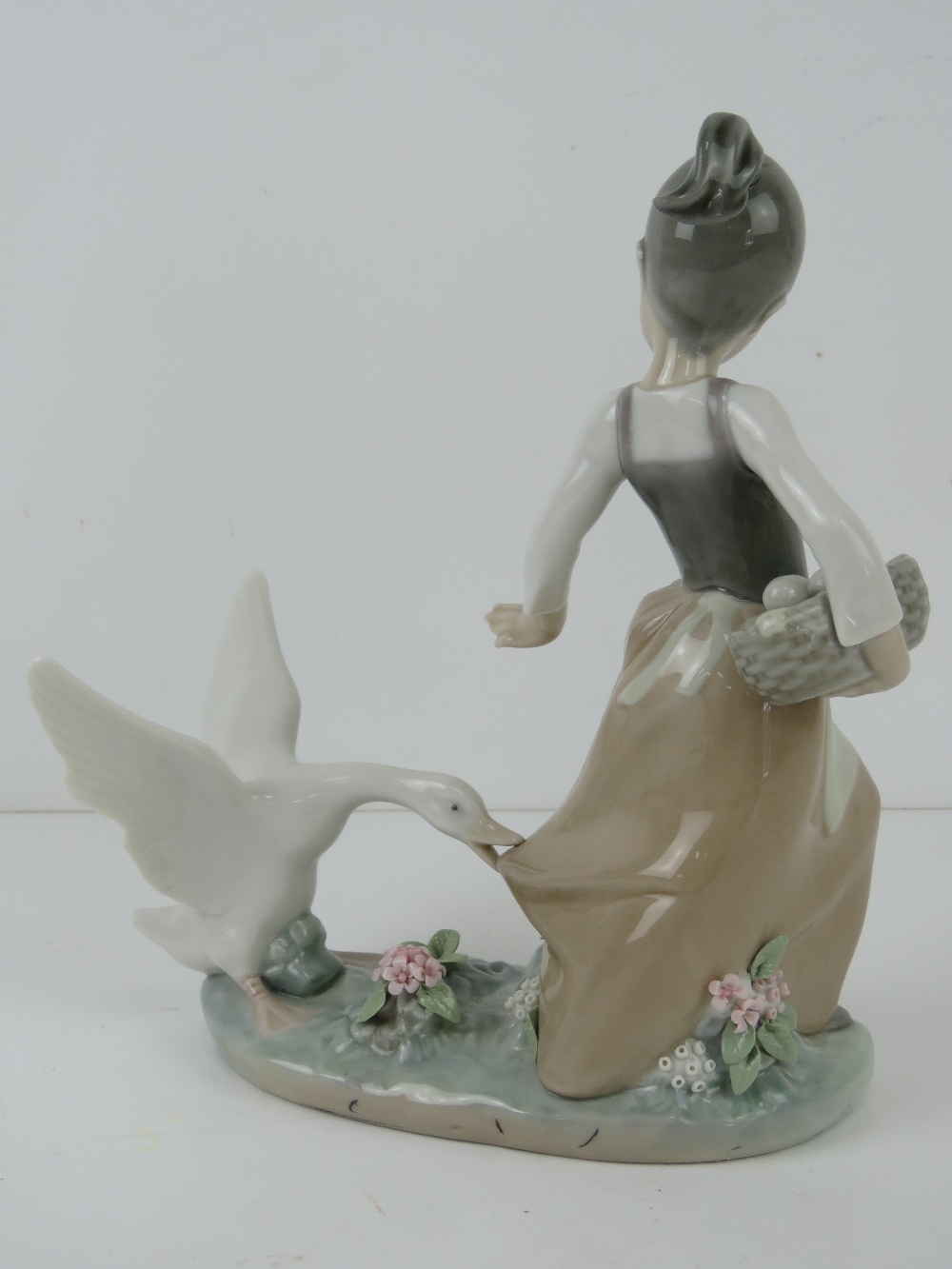 Lladro figurine 1288 'Aggressive Goose' a girl carrying basket of eggs with goose pecking at skirt, - Image 3 of 5