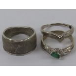 Three silver rings size P-Q, each stamped 925, one set with marquise cut green stone.