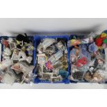 A quantity of assorted mini TY beanie babies, McDonalds toys, Walkers Crisps toys etc.