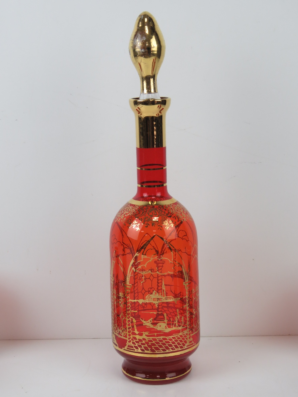 A Venetian ruby glass decanter set having six glasses, all having gilded scene and decoration upon, - Image 3 of 4