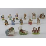 Beatrix Potter Royal Albert figurines each bearing brown back stamp with crown.