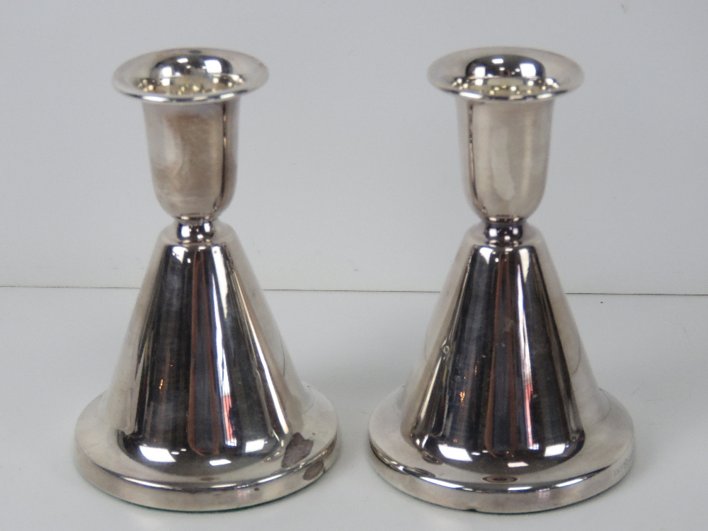A pair of silver Christophersen short candlesticks,
