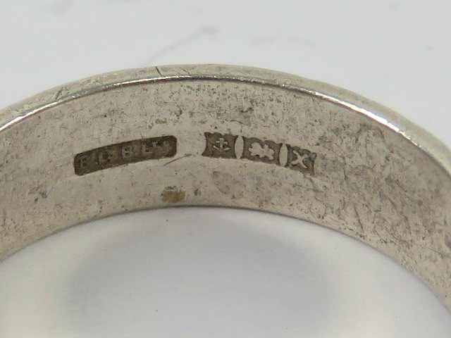 A HM silver ring having continuous engraved pattern to the 6mm wide band, hallmarked Birmingham, - Image 2 of 2