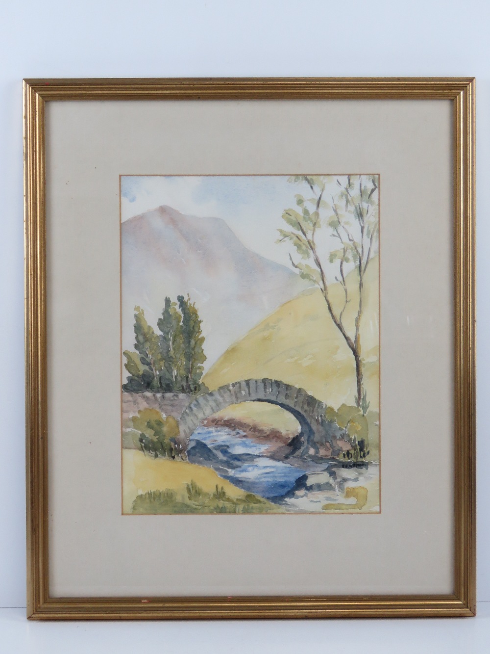 Watercolour by Eve Watson 'Pack horse bridge', signed lower right, 31.5 x 24cm, framed and glazed.